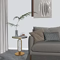 Elegant Round Side Table With Marble Top And Golden Frame By Beige Sofa With Pillow