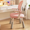 Pink Chair with Mesh Back White Armrests Gray Legs in Front of Desk Green Plant