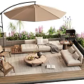 Outdoor Sofa Set On Wooden Patio With Umbrella Grill Plants Flowers And Coffee Table Rug