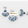 Blue and white ceramic vases with floral patterns three pieces two upright one lying 3d model