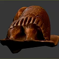 Wooden Sculpture Carving Of Curled Brown Figure With Detailed Texture Displayed On Dark Surface