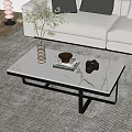 Modern White Marble Coffee Table with Black Metal Base and Decorative Vase Books Camera