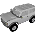 Gray Two Door SUV with Rugged Exterior Design and Large Off Road Tires