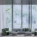 Modern Living Room With Gray Sofa Green Chairs Large Windows And Trees Outside