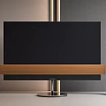 Modern Black Flat Screen TV on Wooden Stand with Golden Speakers in Living Room