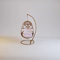 Elegant Modern Hanging Chair with Intricate Metal Frame and Pink Cushion