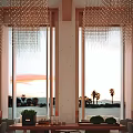 Elegant Modern Hotel Lobby Interior With Pendant Lights Leather Sofas And Wooden Reception Desk