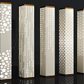 Modern Decorative Columns With Intricate Perforated Patterns Gold Accents And Light Effects