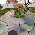 Garden Landscape Outdoor Seating With Green Armchairs Round Table Stone Pavement Rocks And Autumn Tree