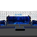 Professional Stage Design With Blue Lighting Effects And Circular Structures