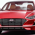 Red Hyundai Car With Modern Sleek Body Design And Alloy Wheels