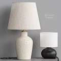 Stylish Table Lamps Featuring White Speckled Ceramic And Black Bases With Fabric Shades