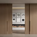 Open Wooden Sliding Doors Revealing Fireplace And Decorative Artworks In Interior