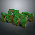 Green Textured Wooden Stone Decor Pieces With Unique Shapes And Rustic Brown Details