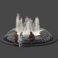 Water Fountain With Multiple Water Jets And Seated Statues On Circular Edge