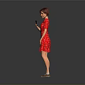Standing In Red Polka Dot Dress Holding Black Cup Against Gray Background With Beige Shoes