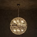 Beautifully Illuminated Spherical Chandelier With Intricate Metal Cutout And Crystal Accents