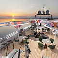 Yacht Deck with Colorful Canopies Tables and Chairs during Sunset with Ambient Lighting