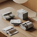 Modern Magazines And Books Stacked On Wooden Table With Open Pages And Simple Design