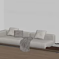 Light Gray Sectional Sofa With Pillows Blanket And Wooden Side Table 3d model