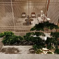 Modern Interior Design With Sofa Curtains Stone Wall And Green Plants