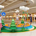 Mall Indoor Children Play Area With Colorful Circular Platform Tree Decorations And White Ball Lights