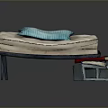 Light diamond quilted mattress with blue pillow and books under transparent box on dark background