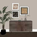 Walnut Wood Dresser With Palm Plant Framed Artworks And Vases In Modern Room