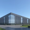 Modern Industrial Factory Building With Glass Curtain Walls Gray Exterior Lawn Area And Paved Road