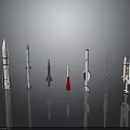 Multiple Space Rocket Models Of Different Colors And Designs Arranged On Black Background With Reflections