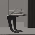 Modern Black Side Table With Curved Frame Stacked Books And Clear Glass Decor