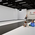 Indoor Fitness Activity Featuring Female Trainer With Children Adults Watching And Background Logo