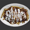 Loaded Fries Topped With White Sauce Red Seasoning And Beans On White Oval Plate
