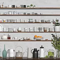 Various Colored Patterned Cups Display With Decorative Vases Oranges And Teapots On Wooden Shelves