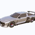 Silver Streamlined Sports Car With Rear Spoiler And Large Alloy Wheels