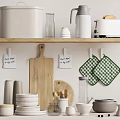 Stylish Kitchenware On Wooden Shelf Featuring Toaster Thermos Green Checkered Pot Holders And Plates