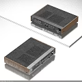 Sleek Compact Black And Gold Audio Amplifier With Control Panel And Ports On Gray Surface