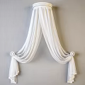 White Sheer Ceiling Drapery with Decorative Knots and Round Ornaments on Light Gray Wall