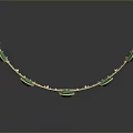 Golden Decorative Crown With Green Gemstones And Ornate Intricate Design Details