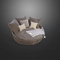 Round Wicker Outdoor Sofa With Neutral Cushions And Soft Throw Blanket For Modern Patio Seating