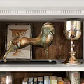 White Display Bookcase With Glass Doors Holding Blue And White Vases Books And Decorations