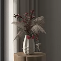 White Geometric Vase With Red Berries And White Pampas Grass On Wooden Table By Window