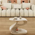 Elegant Modern Sofa And Coffee Table Set With Curved Design Light Curtains And Natural Light