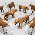 Colorful Plastic Toy Tigers and Cows Figurines with Striped and Spotted Patterns