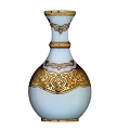 Blue Ceramic Vase With Golden Wing Motifs And Intricate Decorative Patterns