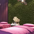 Spa Sauna Room Featuring Massage Beds Pink Sheets Purple Curtains Green Vertical Garden And Chandeliers