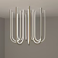 Modern U Shaped Metallic Chandelier With Illuminated Tubes In Minimalist Room