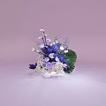 Elegant Floral Display with Purple White Pink Flowers and Green Leaves on Pink Background