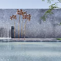 Golden Floral Sculptures With Marble Wall And Water Feature In Pool Reflection