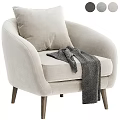 Comfortable Gray Accent Chair with Soft Gray Cushion and Green Throw Blanket on Wooden Legs
